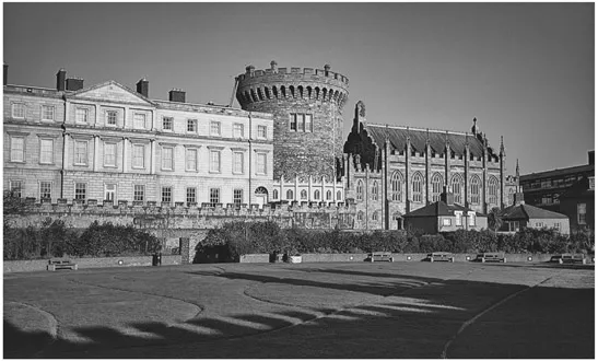 PLATE 1.1 Dublin Castle has been central to Irish history since the Vikings built a fort here in 841–2. The castle dates from ca. 1228 and was the seat of British rule in Ireland until 1921. The Norman Record Tower is the oldest intact part of the castle. In the foreground is the Garda Memorial Garden opened in 2010.