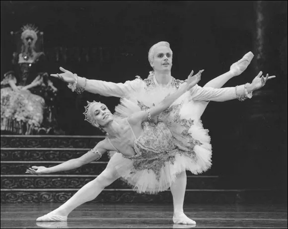 Ballet dancers performing feats as Princess Aurora and Prince Desiré in Sleeping Beauty.