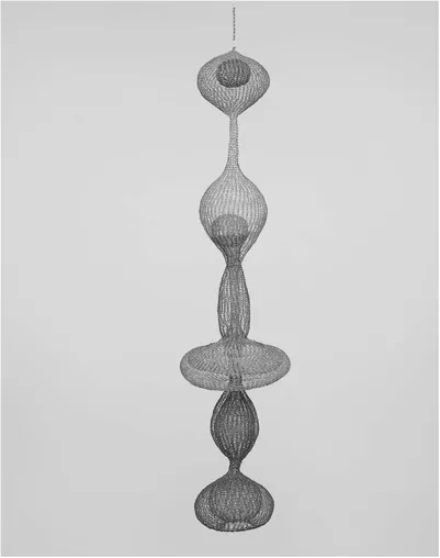 Figure 1.1 Ruth Asawa, Untitled (S. 270, Hanging Six-Lobed Complex Interlocking Continuous Form within a Form with Two Interior Spheres), 1955/1958. Hanging sculpture, brass and steel wire, 63 7/8 × 15 × 15 in. (162.2 × 38.1 × 38.1 cm).