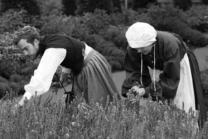 Figure 1.1 Ordsall Hall, Salford staff acting as historical herb pickers. © DMC Photographic