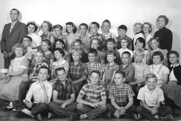 Figure 1.7 Lenora (top right) with her students