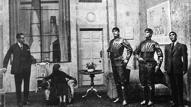 Figure 1.1 A scene from the play R.U.R., showing three robots.