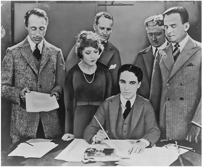 Figure 1.1 Charlie Chaplin signing a contract with United Artists6