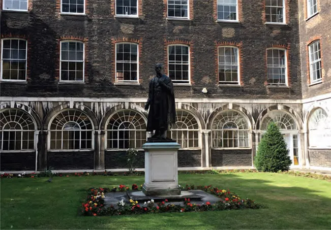 Figure 1.2: One of the two inner quadrangles of the Victorian parts of Guy’s Hospital, one of which contains the statue of Lord Nuffield, who was the chairman of governors and a major benefactor. The philosopher Ludwig Wittgenstein worked incognito here between 1941 and 1942 as a porter and ointment maker.