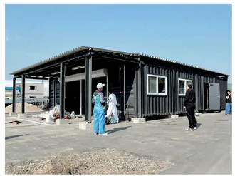 The completed Banya building, Shizugawa, a new workplace for the fishermen, to help develop a collective acquafarming business. Its furnishings were designed and built through the AfH workshop with Kyoto University of Art and Design.