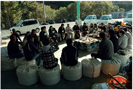A community meeting to discuss the Banya building for the local fishermen, attended by ocean farmers, local stakeholders, AfH representatives and students from Kyoto University of Art and Design.