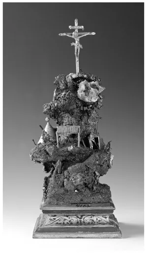 FIGURE 1.1 Handstein with mine scene and crucifixion. Bohemian, mid-sixteenth century, silver, gilding, wood, mineral specimens, including proustite, argentite, marcasite, lautite, malachite, quartz, fluorite. H. 27.1. Kunsthistorisches Museum, Vienna KK 4167.