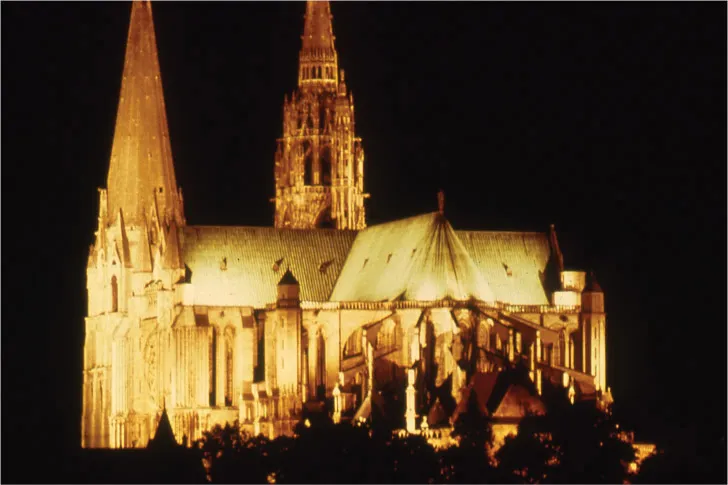 Figure 1.5 The same building, but a vastly different appearance. Low ambient illumination provides a dark backdrop against which the cathedral glows with brightness. Object attributes are unrecognisable in this example of unrelated colours.