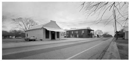 FIGURE 1.1 Downtown Newbern, from left, storage barn, Red Barn (Rural Studio’s design studio), post office, and Newbern Mercantile, Newbern, Alabama Source: Tim Hursley