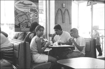 PHOTOGRAPH 1.1 A Dominican Family at McDonald's. (Photo courtesy of Samantha Rosemellia, reprinted with permission)