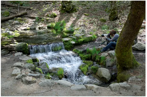 FIGURE 3 Zooming in on the small waterfall lets it fill the frame, but the shot still isn’t as good as it could be.