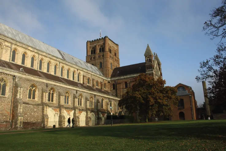 Photograph of the Cathedral and Abbey Church of St Alban in England that has been regularly restored, altered, adapted, and extended. The structure  exemplifies numerous examples of recycling, most notably the Roman era bricks that form the tower.