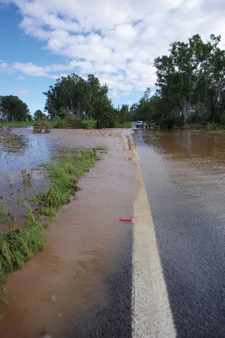 (A) Submerged culvert road embankment in the Coomera river catchment QLD on 31 March 2017 following tropical cyclone Debbie – runoff from right to left