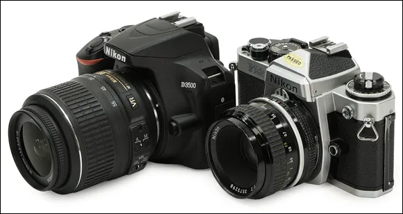 Photo depicts the Digital SLRs (left) which have come a long way from their predecessor (right).