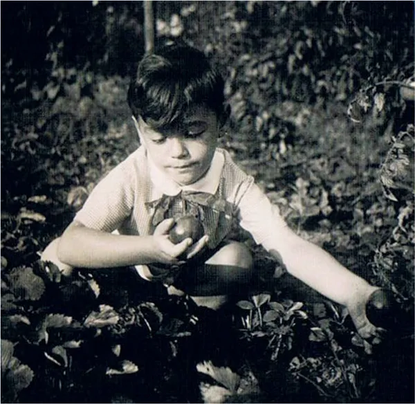 Childhood photo of Thomas. Caption reads: