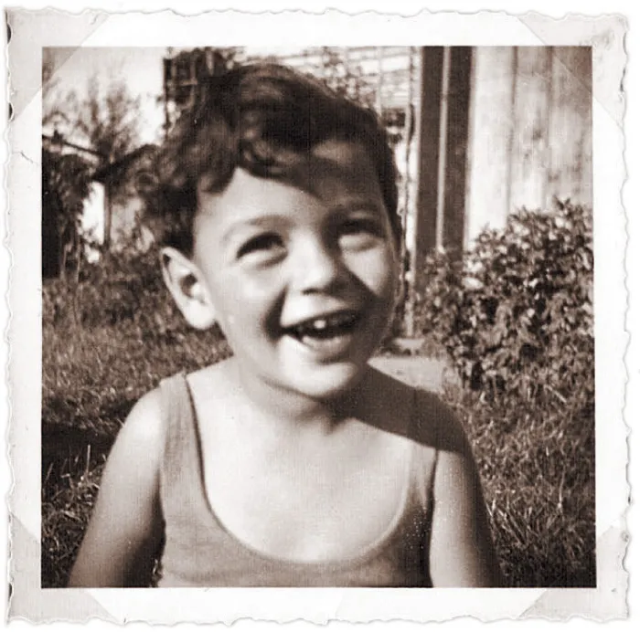 Childhood photo of Thomas. Caption reads: