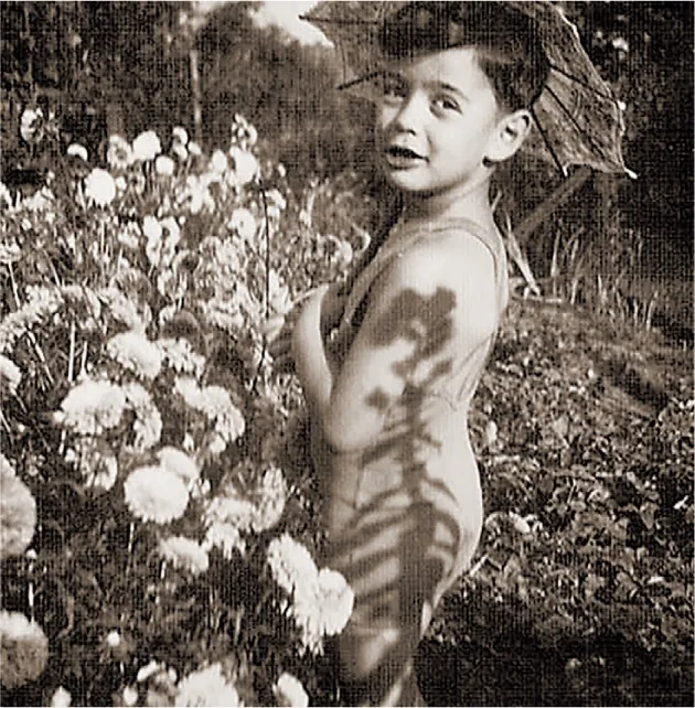 Childhood photo of Thomas. Caption reads: