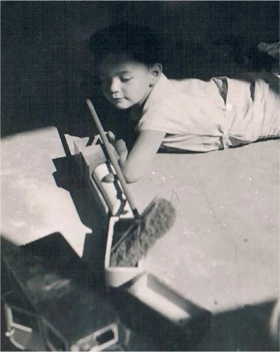 Childhood photo of Thomas. Caption reads: