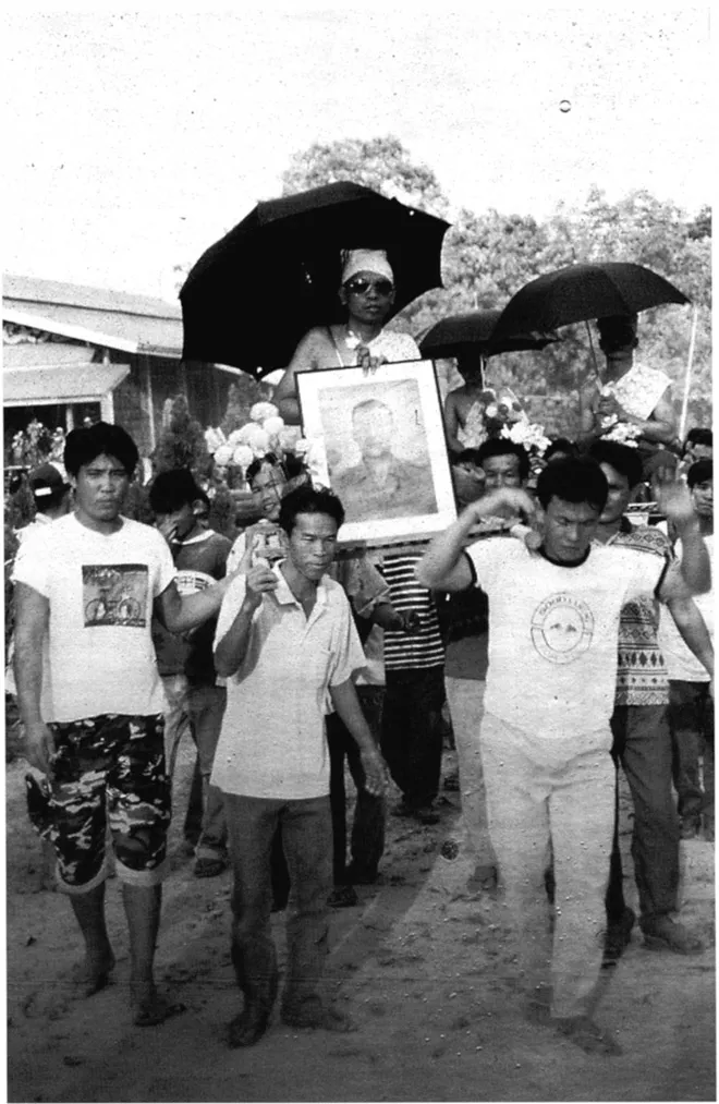 Plate 1.1: Hae naag procession bearing young men for ordination as Buddhist monks.