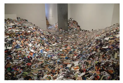 1.2 Making a comment on the number of images being constantly consumed by us on various social media sites Erik Kessels filled a gallery with thousands and thousands of images to represent twenty-four hours of Flickr uploads.