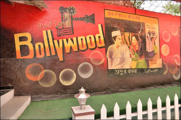 Photo depicts Bollywood wall painting outside a film studio in Mumbai.