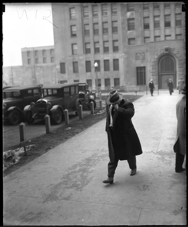 Capone in front of the detective bureau