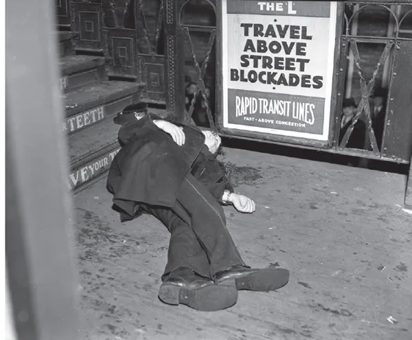 Policeman Arthur Sullivan, 38, of the Marquette station...