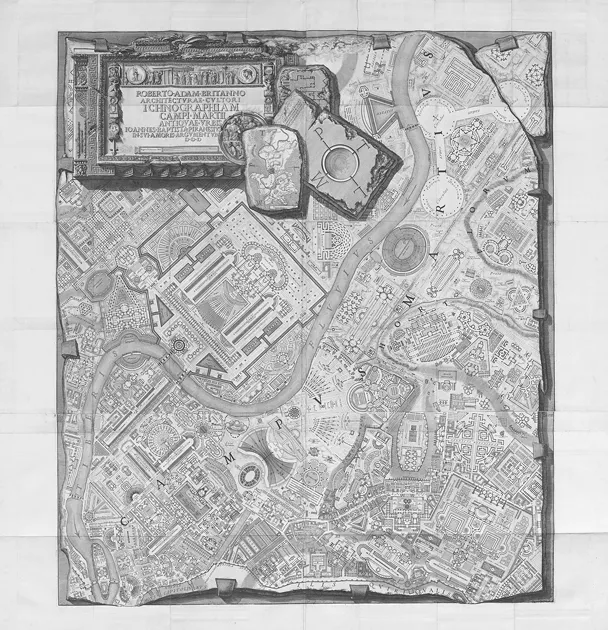 A nearly square stone tablet etched with an aerial view of Rome, the river running diagonally across and ancient buildings illustrated as remaining fragments of their detailed internal structures. On the top left a smaller stone tablet with inscriptions and other fragments of etchings on stone, with shadows giving depth.