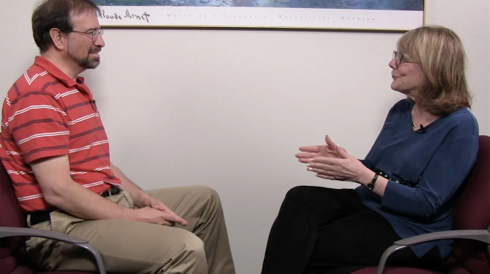 Photo of Elizabeth Loftus and Howard Burton in conversation