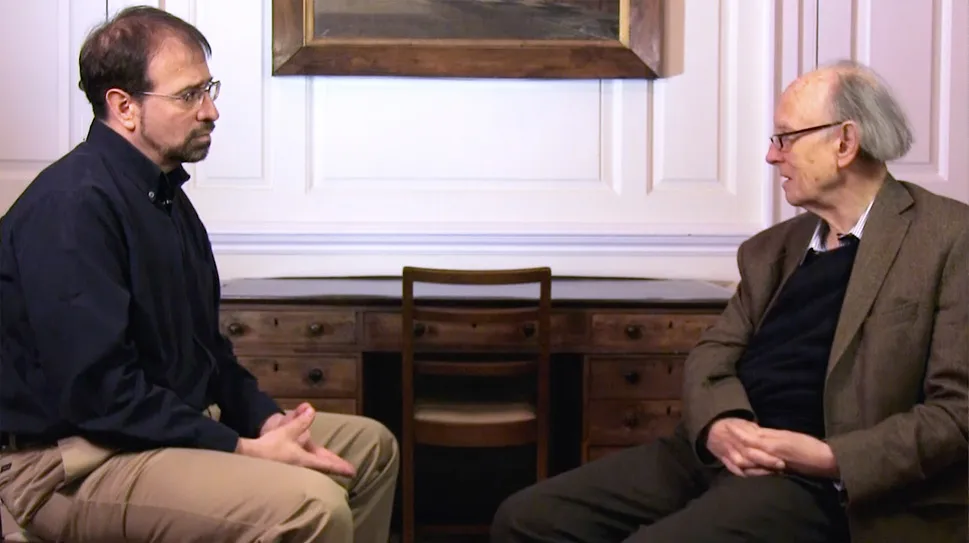 Photo of John Dunni and Howard Burton in conversation