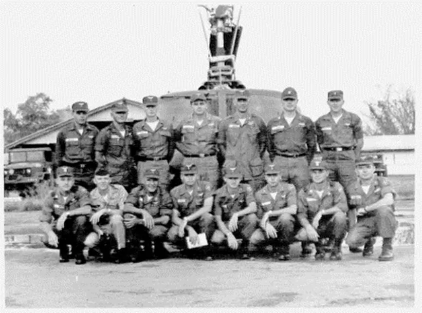 A group of men posing for a photo

Description automatically generated with medium confidence