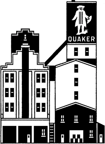 Two buildings joined together. On the left, a tall rectangular building with a stepped roof, on the right a shorter, gabled building with a large mill tower emerging from it. The mill tower reads “Quaker” and has a drawing of a quaker on. A chute runs down from the mill tower to the left-hand building.