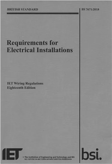 A picture of the front cover of the 18th Edition of the IET Wiring Regulations.