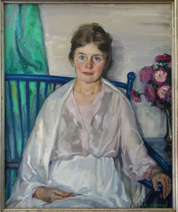 Margaret Bruton’s portrait of her mother, Helen Bell Bruton. In the painting, a light-skinned woman with blonde hair tied back is wearing a white dress and is sitting on a blue chair. Beside her on the table are some bright pink flowers.
