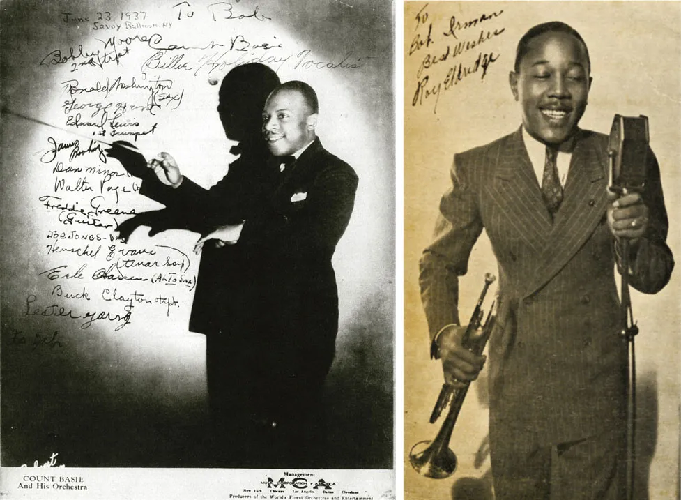A black and white photograph showing William “Count” Basie in front of a wall with messy handwriting on it. He is under a circular spotlight and therefore casts a dark shadow behind him. A black and white photograph showing Roy Eldridge in a striped suit. He is holding a trumpet with his right hand and a microphone with his left hand. The background is plain, and he has signed his name on the top left corner of the photograph.