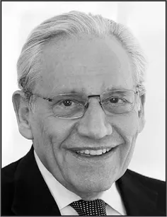 A professional portrait of Bob Woodward wearing a suit and tie.