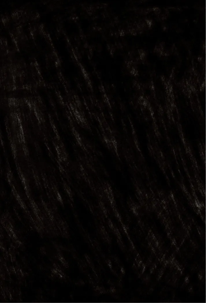 This image is split in two. The page is filled entirely in black, made up of scribbled marks.