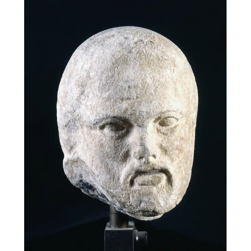 Frammenti della decorazione del Partenone, V secolo a.C.: testa di fanciullo e testa maschile. 