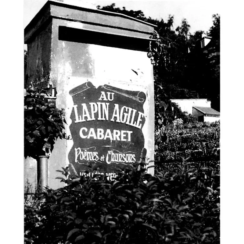 L’insegna del famoso cabaret Au lapin agile, luogo di ritrovo di numerosi artisti negli anni tra Otto e Novecento.