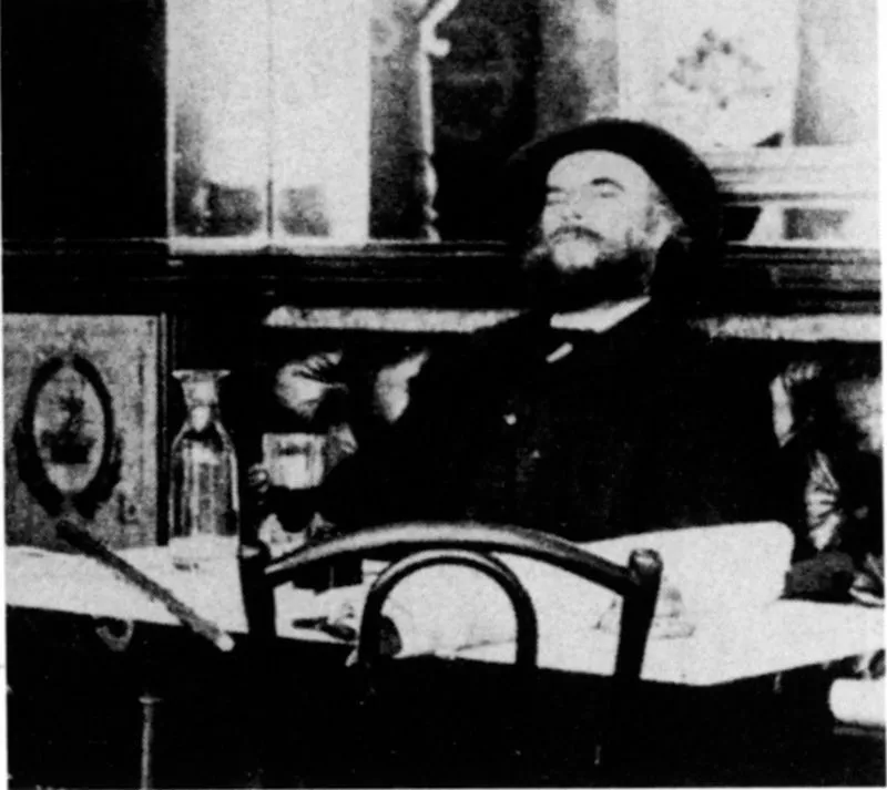 Il poeta Paul Verlaine al tavolo del caffè Procope.