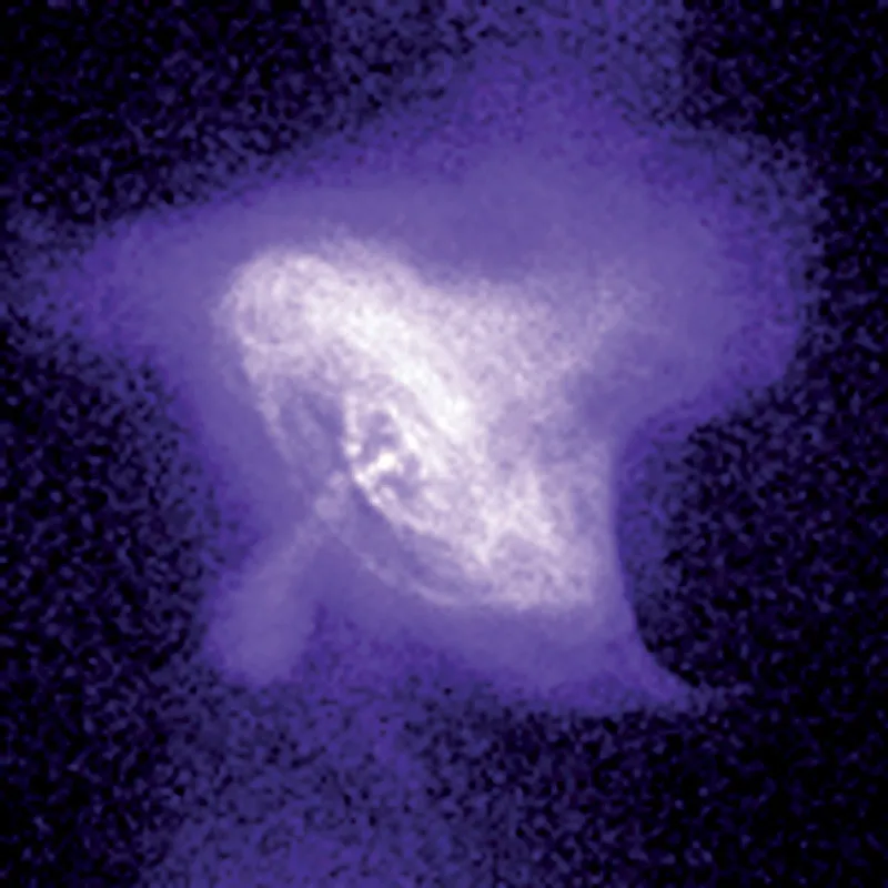 IMMAGINE 21 La nebulosa del Granchio ai raggi X fotografata dal satellite Chandra: sono visibili il disco di accrescimento e i due getti dai quali viene espulsa materia.