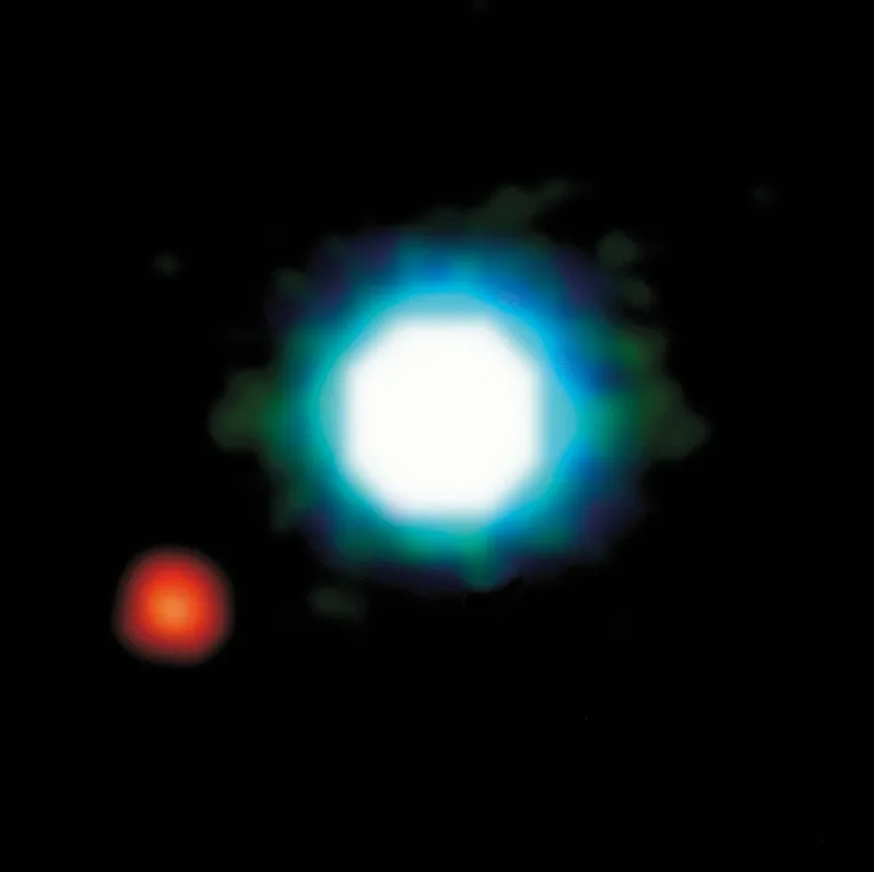 Immagine elaborata al computer di un possibile pianeta extrasolare (in rosso) attorno a una sfera molto calda che non è abbastanza grande da diventare una stella (in bianco). Si ritiene che il pianeta sia cinque volte la massa di Giove, e questa foto potrebbe essere la prima immagine mai catturata di un esopianeta.