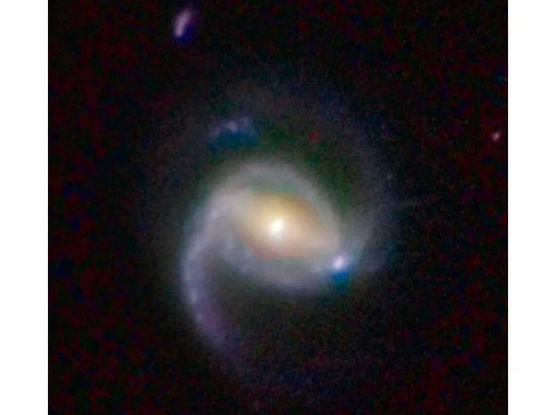 2,1 miliardi di anni luce. © NASA, ESA, and Z. Levay (STScI).