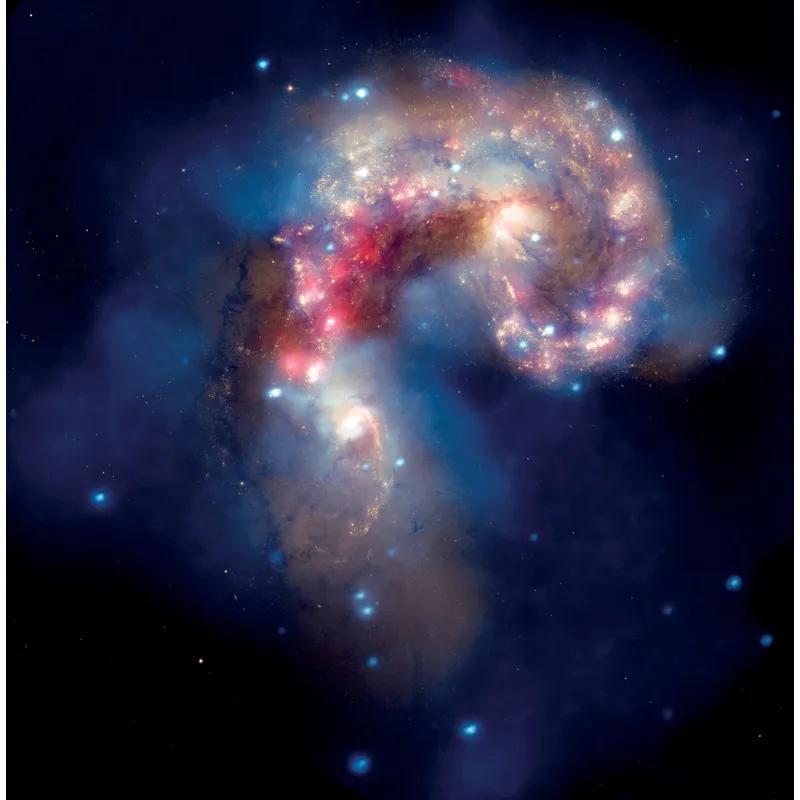 Un paio di galassie che si stanno mescolando a circa 62 milioni di anni luce lontano dalla Terra. © X-ray: NASA/CXC/SAO/J.DePasquale; R: NASA/JPL-Caltech; Optical: NASA/STScI.