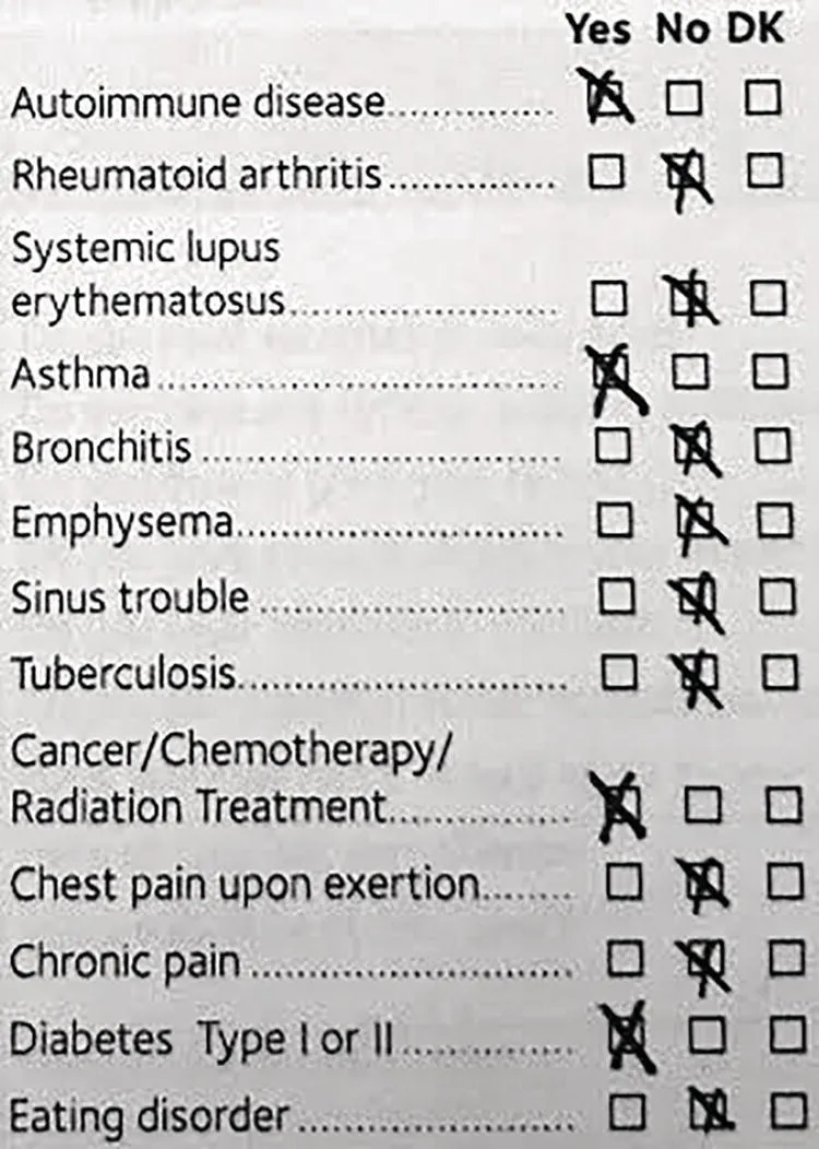 Photo depicts a sample health history form filled out by a patient.