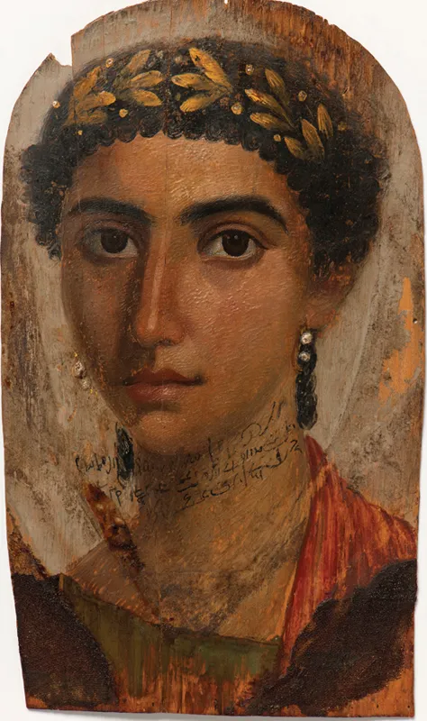 A portrait of a woman named Eirene. She wears a gold laurel wreath in her hair and long silver earrings.