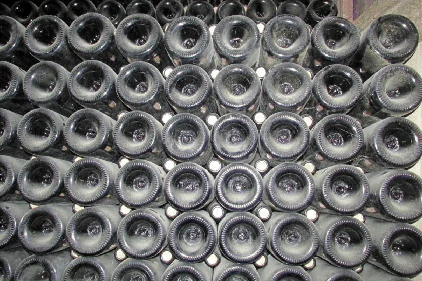 A painting depicting the Glass of Wine created by Johannes Vermeer c. 1658–1660.