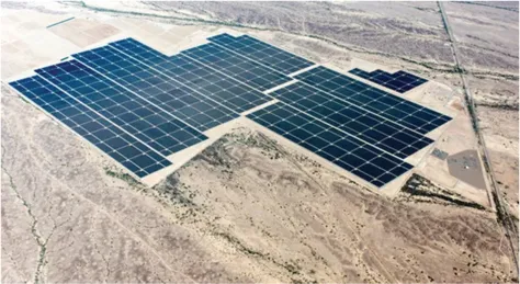 Picture displays a giant blue-black field of 5.2 million solar panels in Arizona that can turn 300 megawatts of silicon photovoltaics (PV) into electricity.