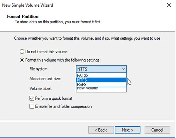 Screenshot shows Format Partition window which includes format options to choose file system, allocation unit size, and volume label and checkboxes to perform quick format and enable file and folder compression.
