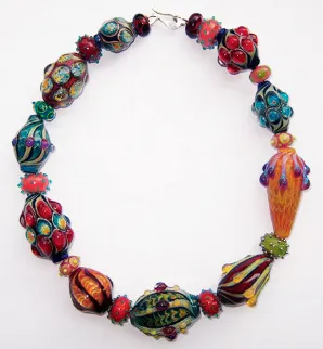 Photo shows bracelet made of colourful glass beads.